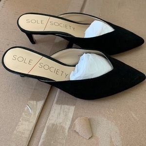 Worn twice black Sole Society heels mules.
